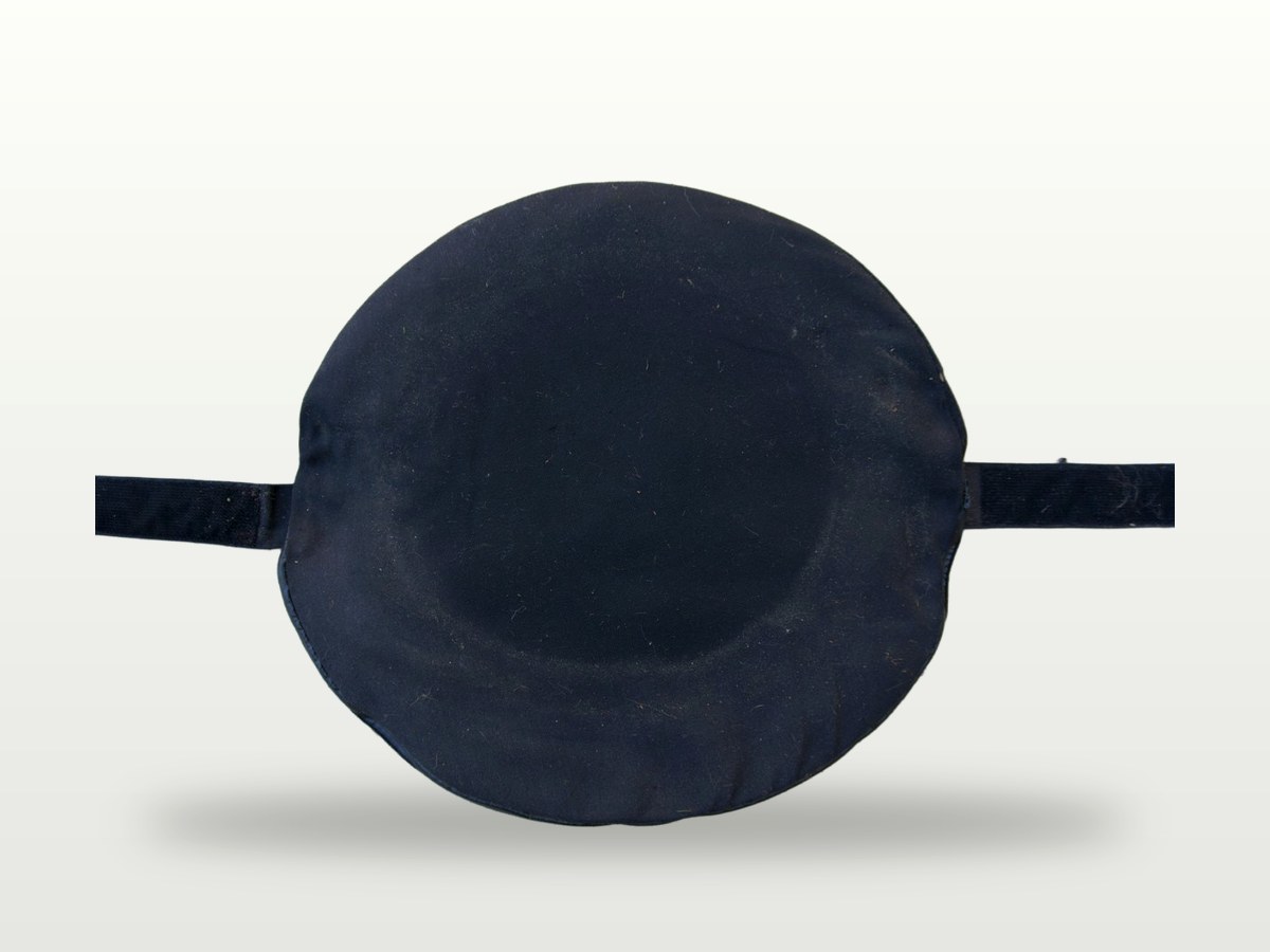 The CanClamp base and strap laid out flat on a clean studio background